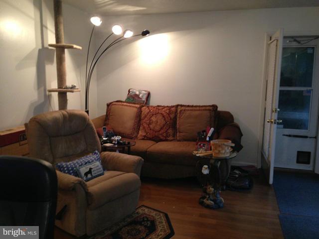 341 Luchase Road Linden, VA 22642 - Photo 3 of 30 a living room with furniture and a flat screen tv