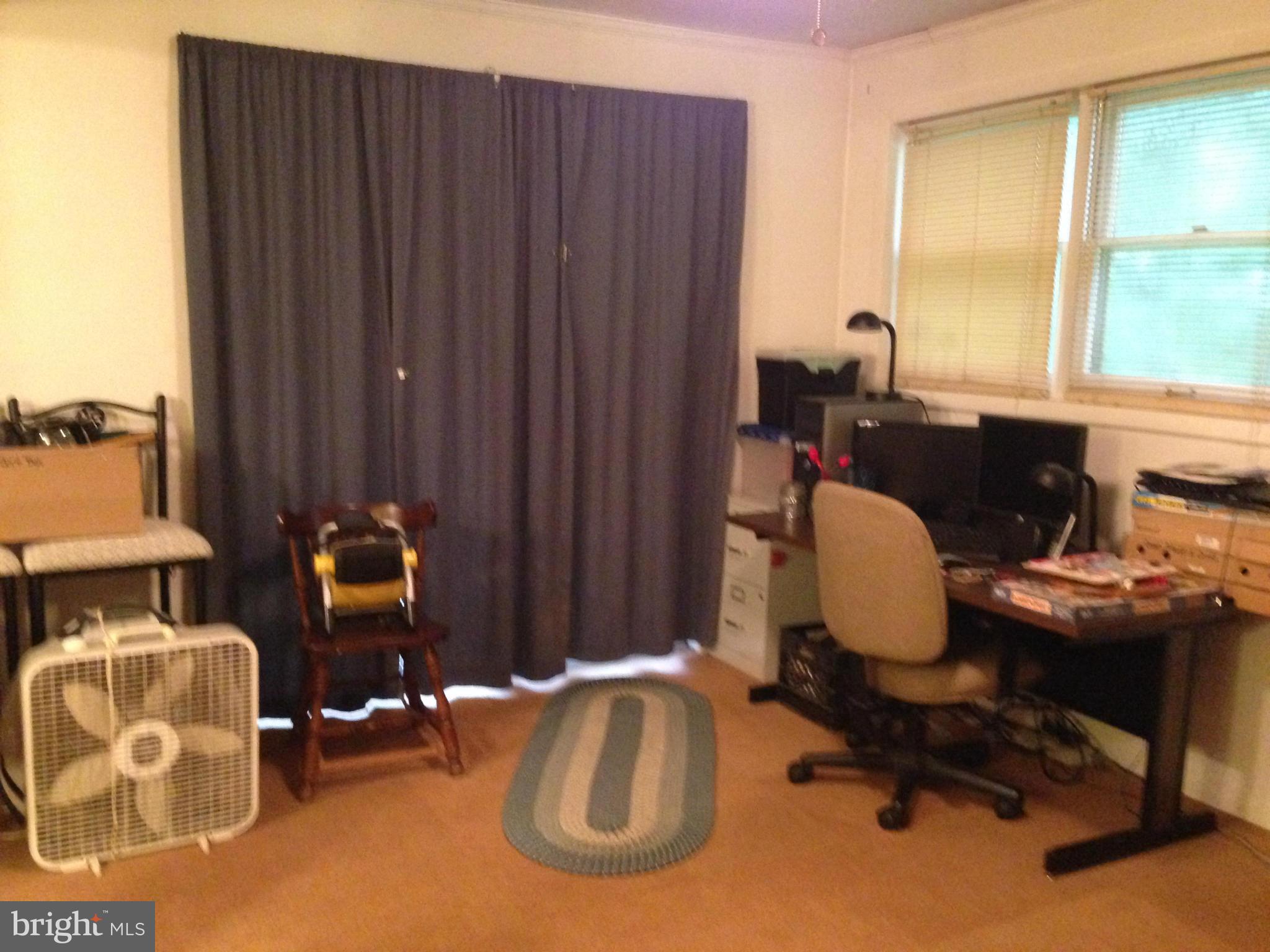 341 Luchase Road Linden, VA 22642 - Photo 21 of 30 a bedroom with furniture and a window