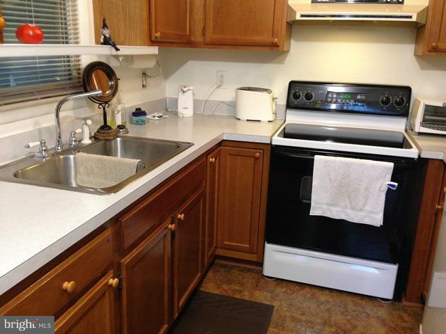 341 Luchase Road Linden, VA 22642 - Photo 4 of 30 a kitchen with a sink and a stove