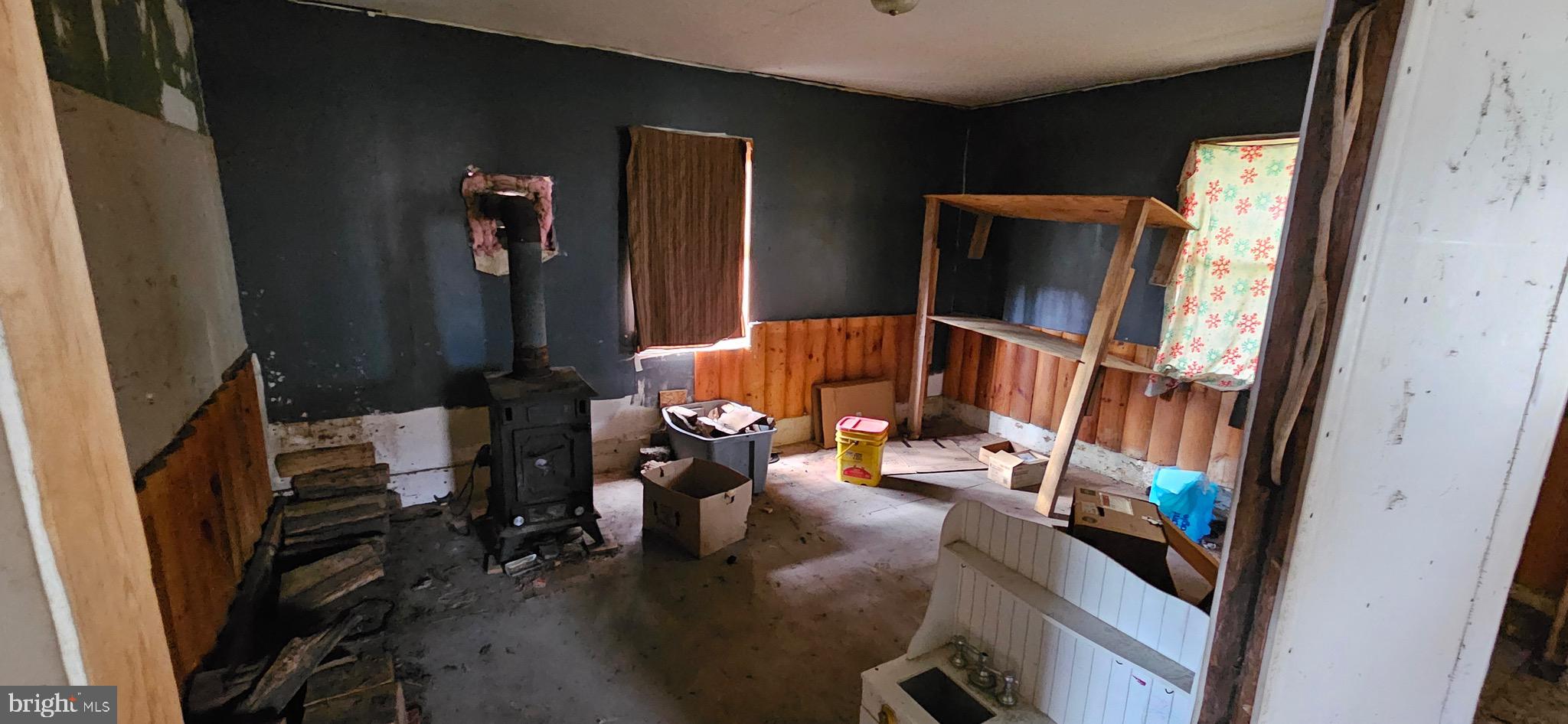 68 Maple Street Burnside, PA 15721 - Photo 20 of 22 a living room with furniture and a window