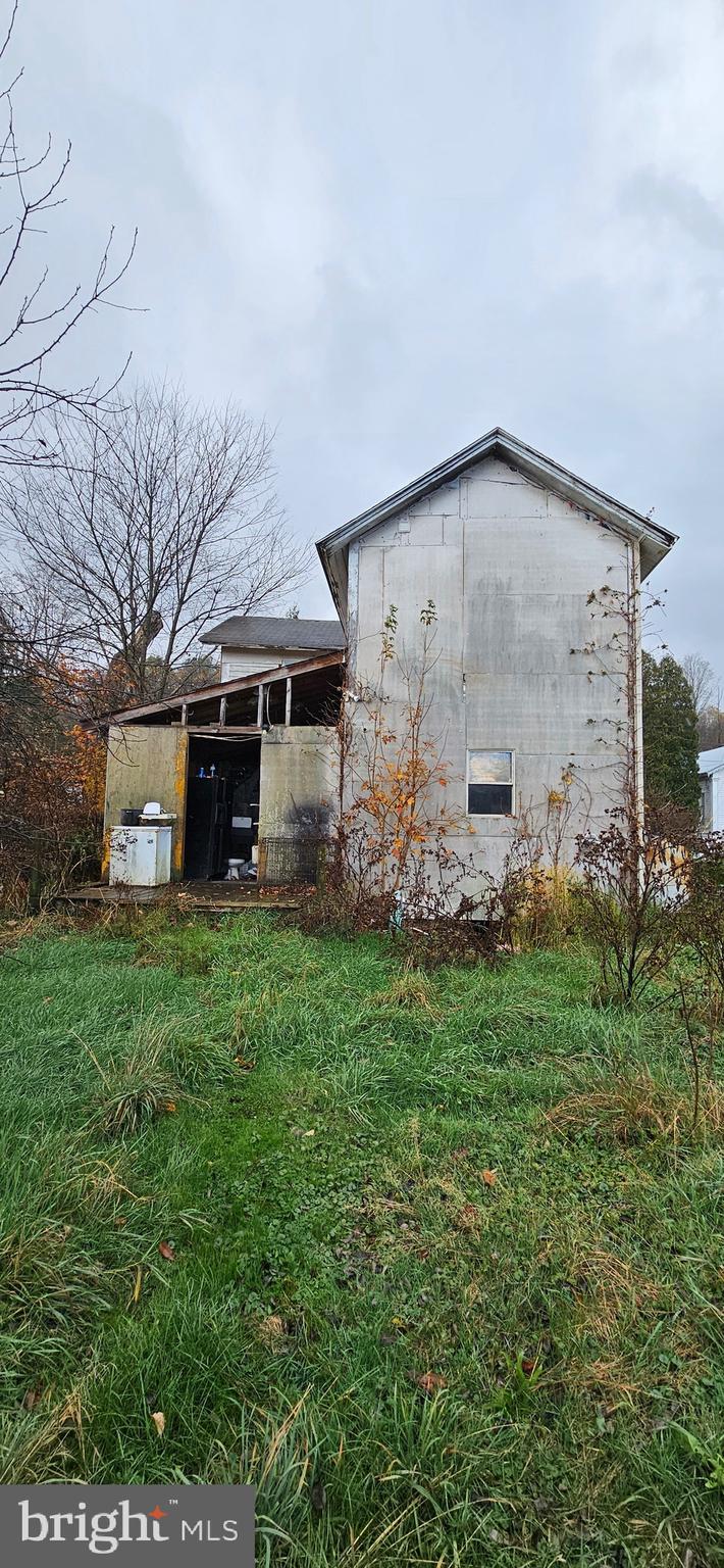 68 Maple Street Burnside, PA 15721 - Photo 4 of 22 a view of a house with a yard