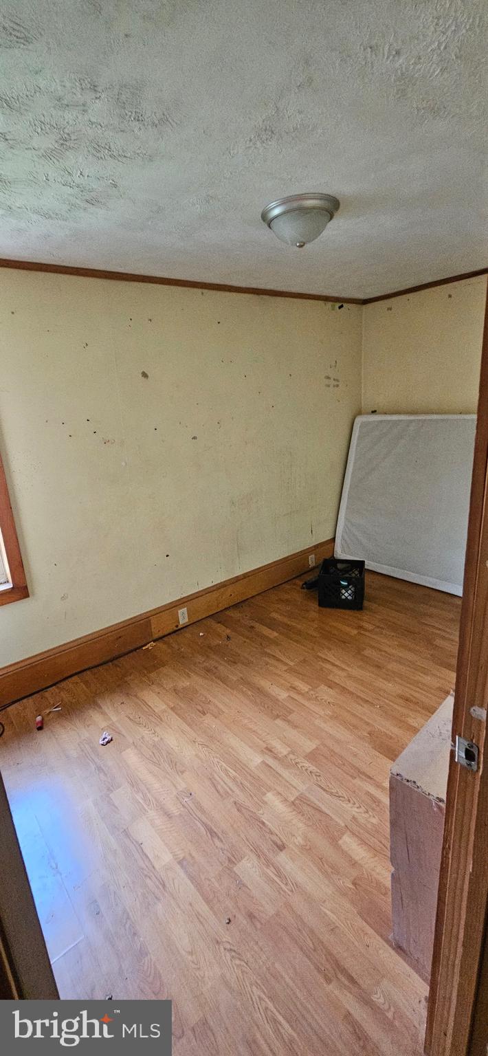 68 Maple Street Burnside, PA 15721 - Photo 7 of 22 a view of a room with wooden floor