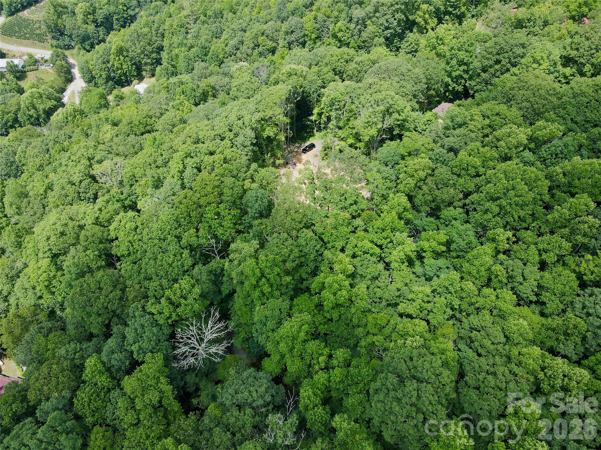 Tbd Old Chestnut Mountain Road Newland, NC 28657 - Photo 15 of 33 an aerial view of residential house with outdoor space and trees all around
