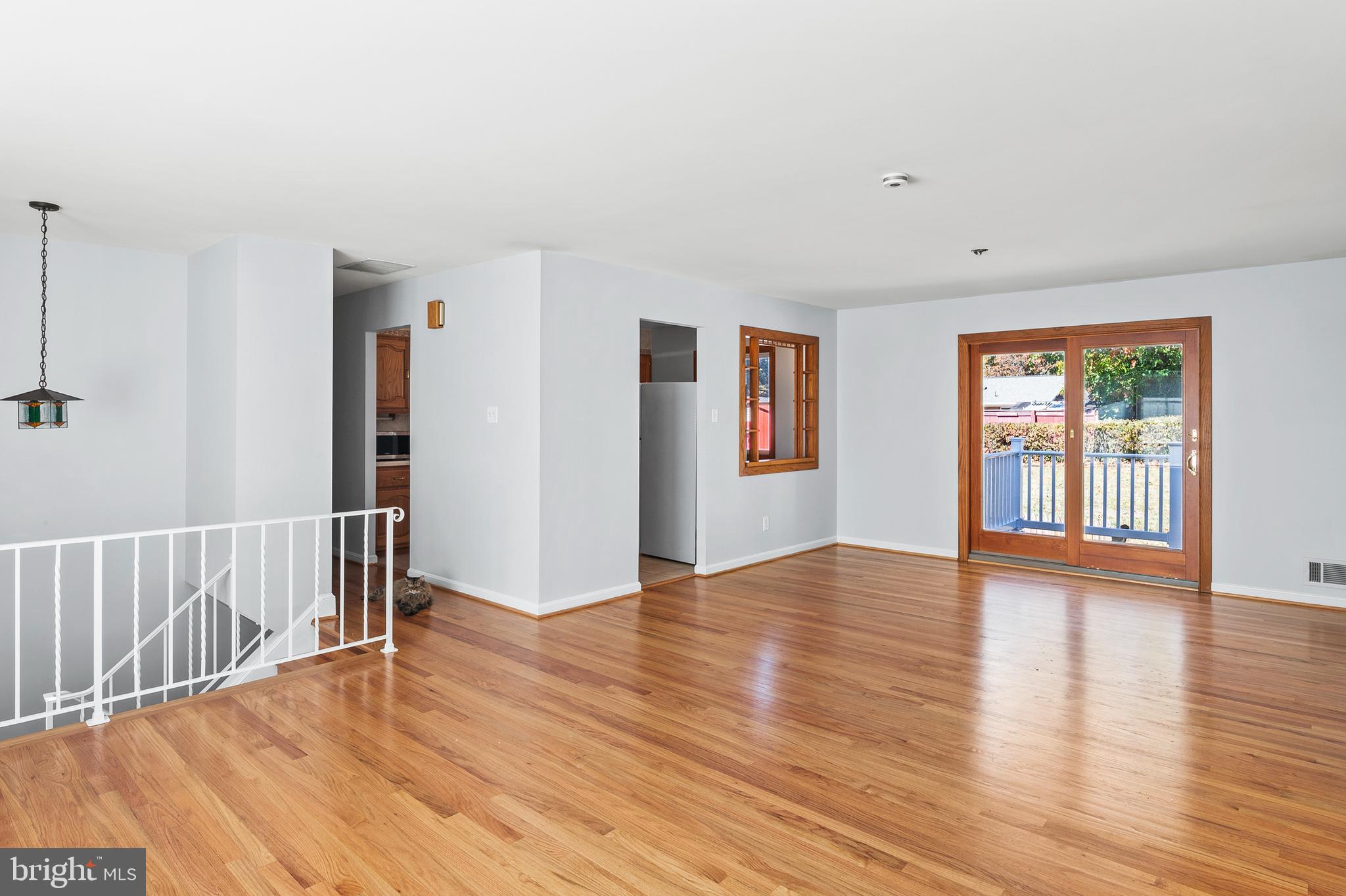 1904 Powder Mill Road Silver Spring, MD 20903 - Photo 7 of 43 a view of an empty room with wooden floor and a window