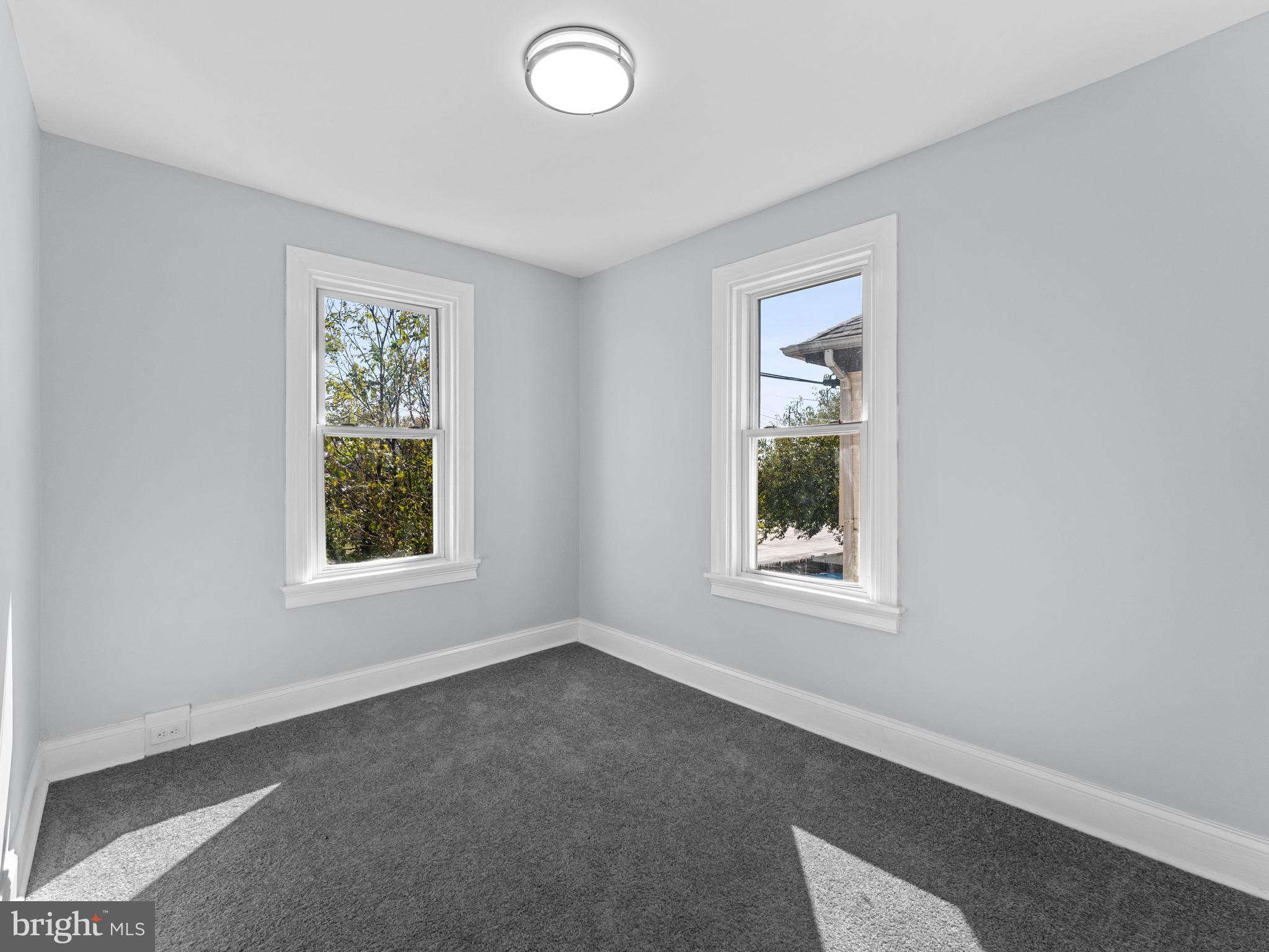 125 White Avenue Marcus Hook, PA 19061 - Photo 13 of 23 an empty room with a window