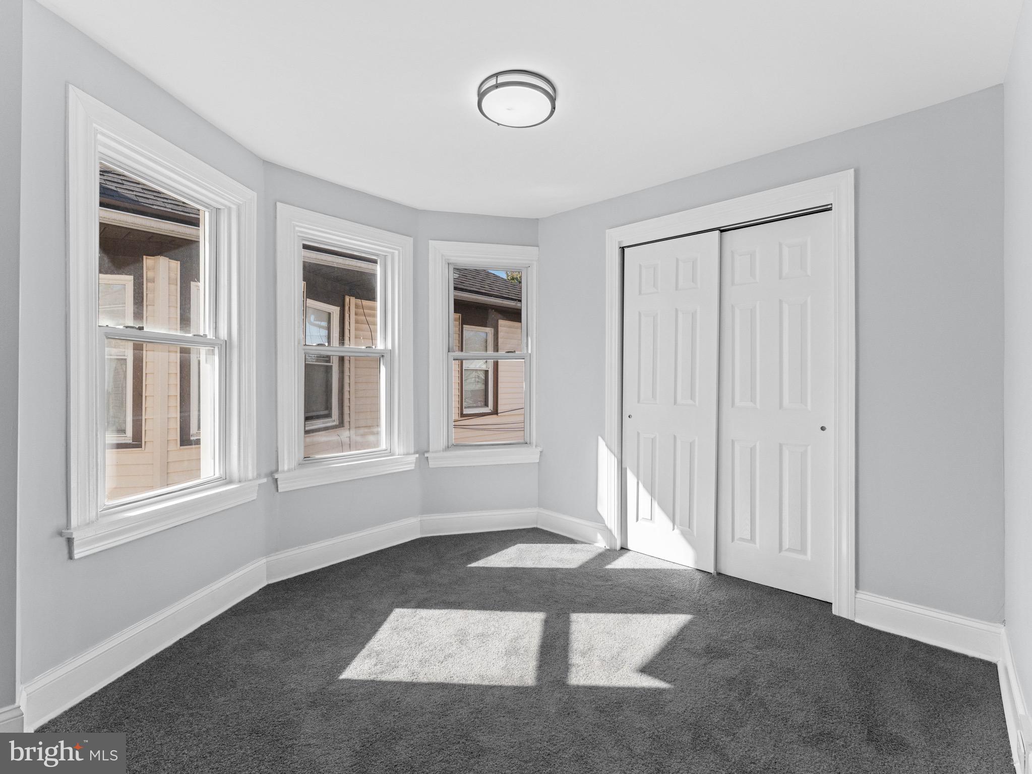 125 White Avenue Marcus Hook, PA 19061 - Photo 15 of 23 an empty room with windows and closet