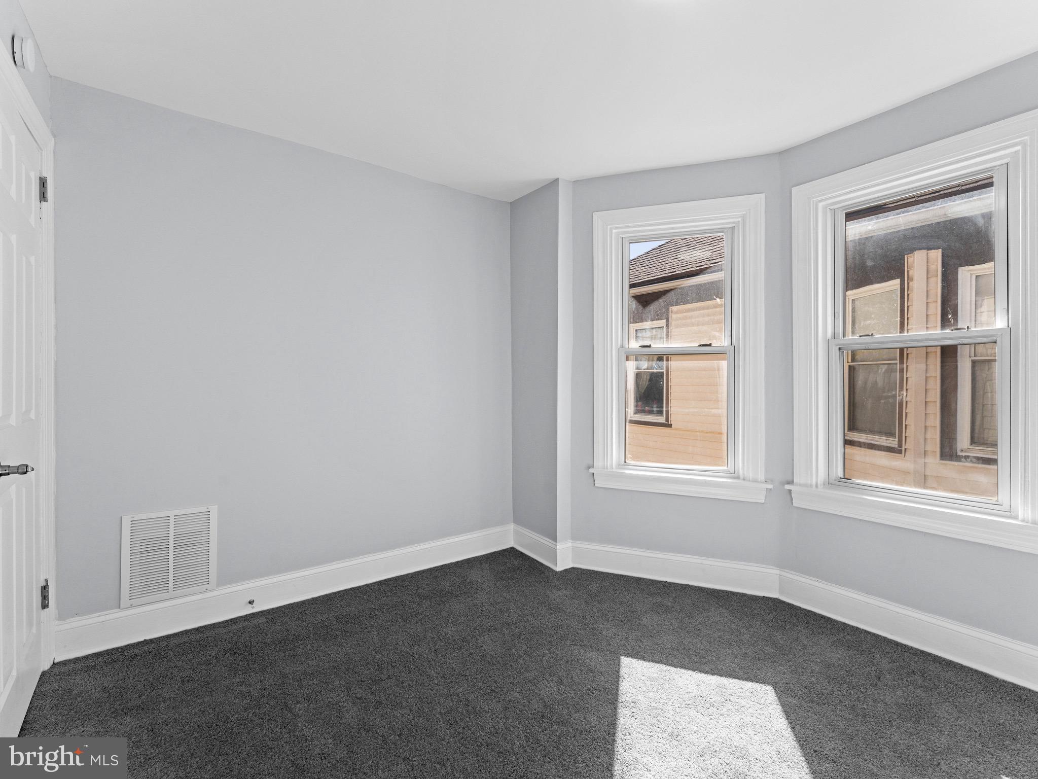 125 White Avenue Marcus Hook, PA 19061 - Photo 16 of 23 a view of an empty room with a window