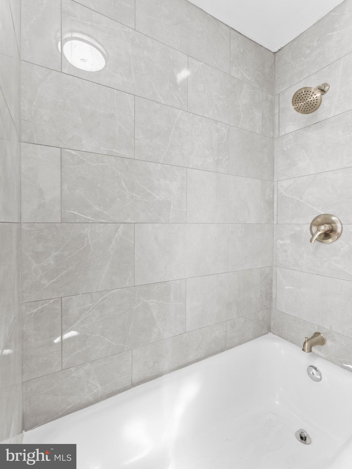 125 White Avenue Marcus Hook, PA 19061 - Photo 19 of 23 a bathroom with a bathtub