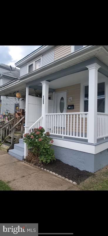 125 White Avenue Marcus Hook, PA 19061 - Photo 2 of 23 a view of a house with a small yard