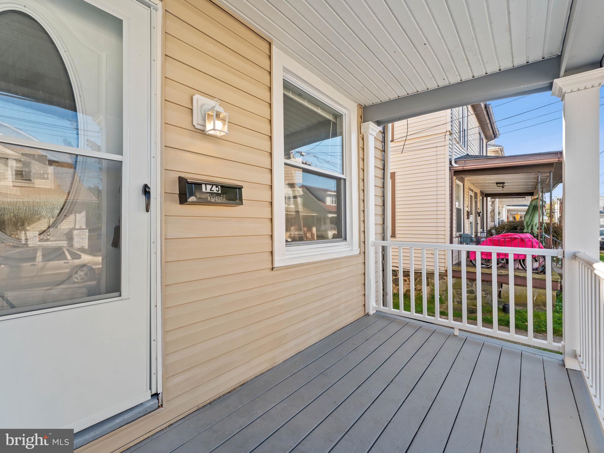 125 White Avenue Marcus Hook, PA 19061 - Photo 3 of 23 a view of a house with a porch
