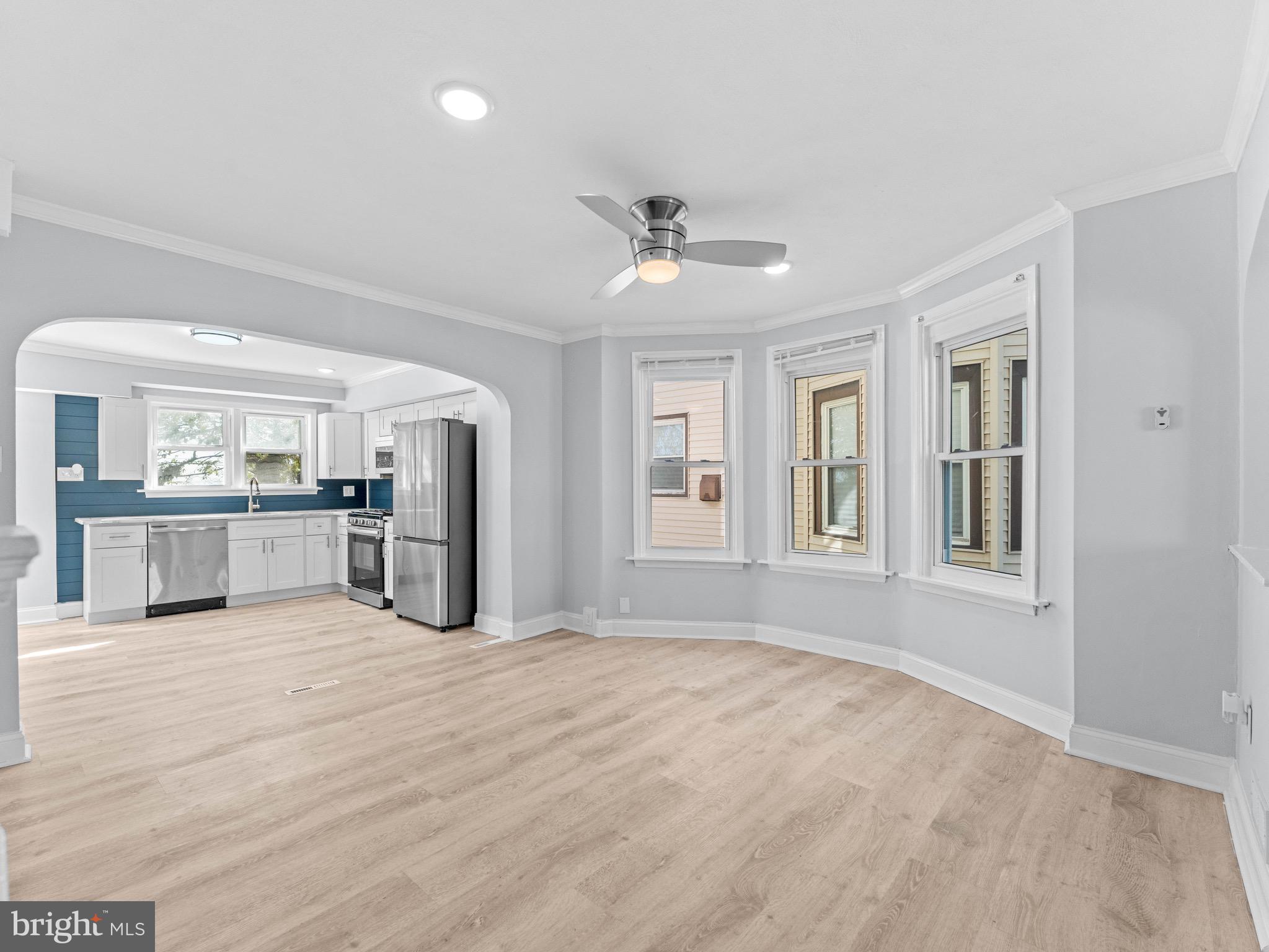 125 White Avenue Marcus Hook, PA 19061 - Photo 6 of 23 a view of an empty room with closet and windows