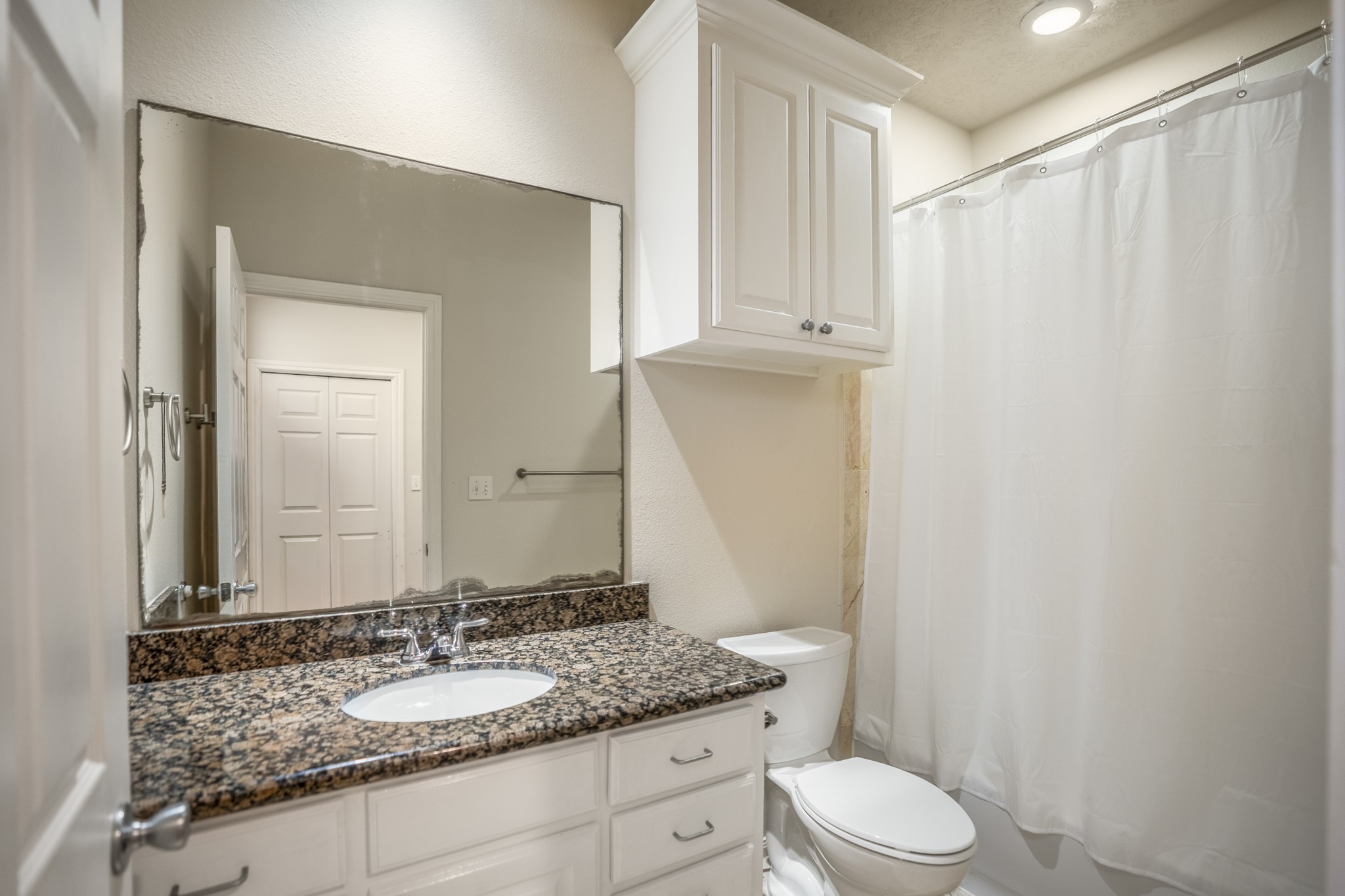 4236 Drake Street Houston, TX 77005 - Photo 29 of 43 The second floor full bath offers a tub/shower combo, situated near the two secondary bedrooms.