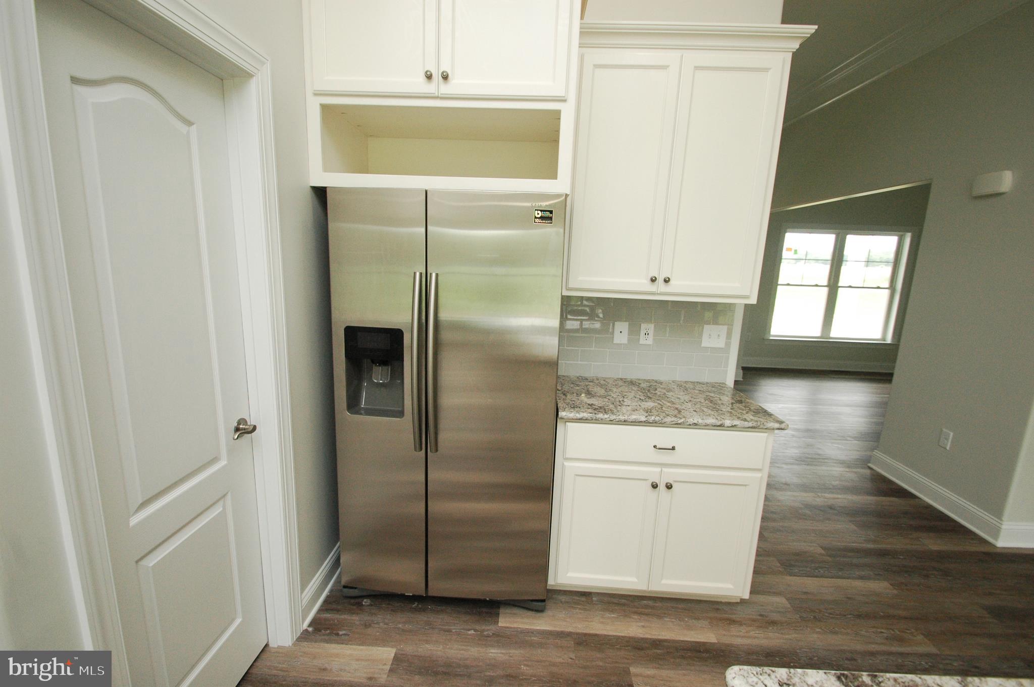 9017 Clendaniel Pond Road Lincoln, DE 19960 - Photo 11 of 30 Door to Pantry and Refrigerator