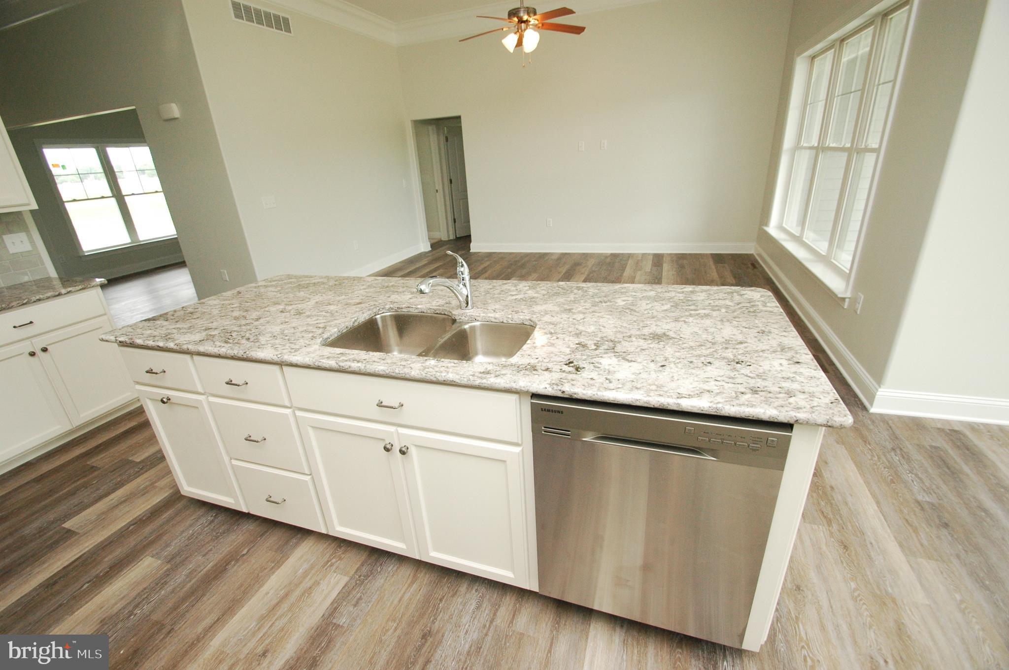 9017 Clendaniel Pond Road Lincoln, DE 19960 - Photo 17 of 30 Kitchen Island looking into the Great Room.