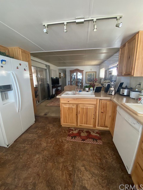 12874 California Street, Unit 48 Yucaipa, CA 92399 - Photo 13 of 21 a room with lot of cabinets and appliances