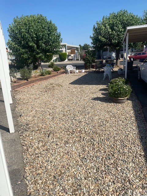 12874 California Street, Unit 48 Yucaipa, CA 92399 - Photo 16 of 21 a view of a backyard of a house