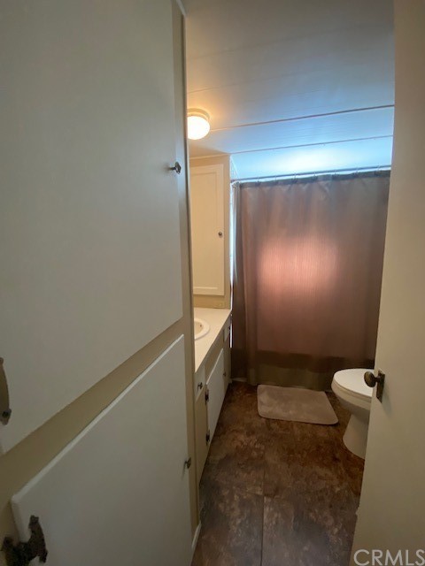 12874 California Street, Unit 48 Yucaipa, CA 92399 - Photo 6 of 21 a bathroom with a sink and toilet