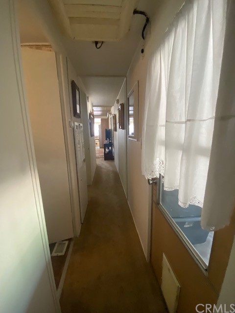 12874 California Street, Unit 48 Yucaipa, CA 92399 - Photo 7 of 21 a view of a hallway