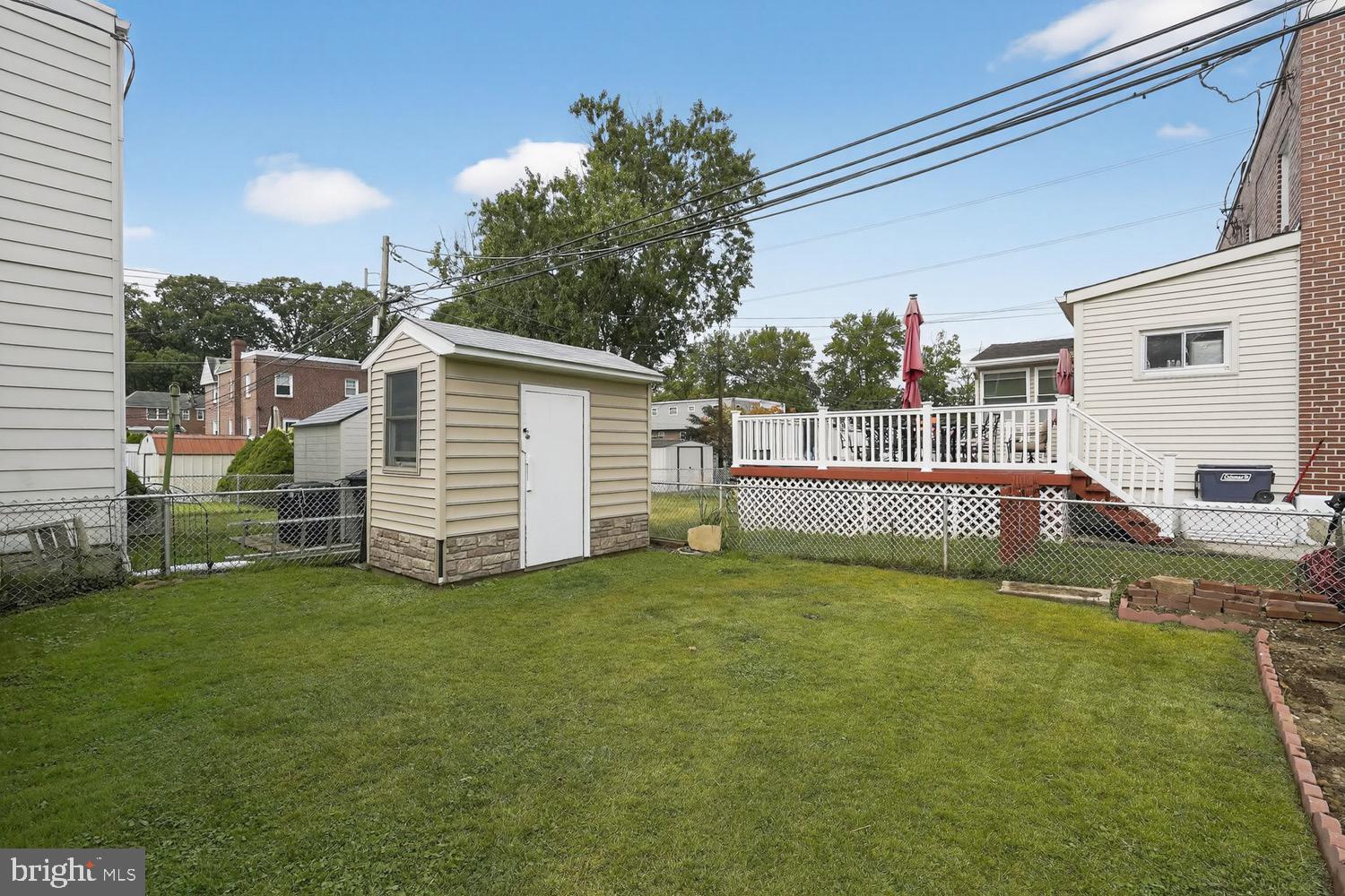 431 East Rodgers Street Ridley Park, PA 19078 - Photo 14 of 21 Charming backyard with shed and deck oasis.