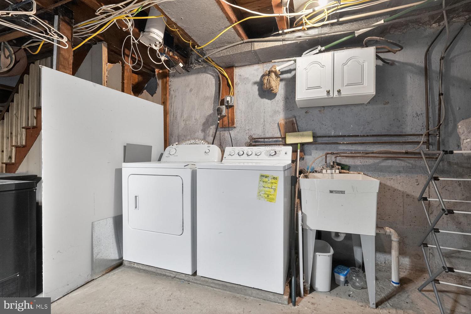 431 East Rodgers Street Ridley Park, PA 19078 - Photo 16 of 21 Functional laundry area in a basement setting.