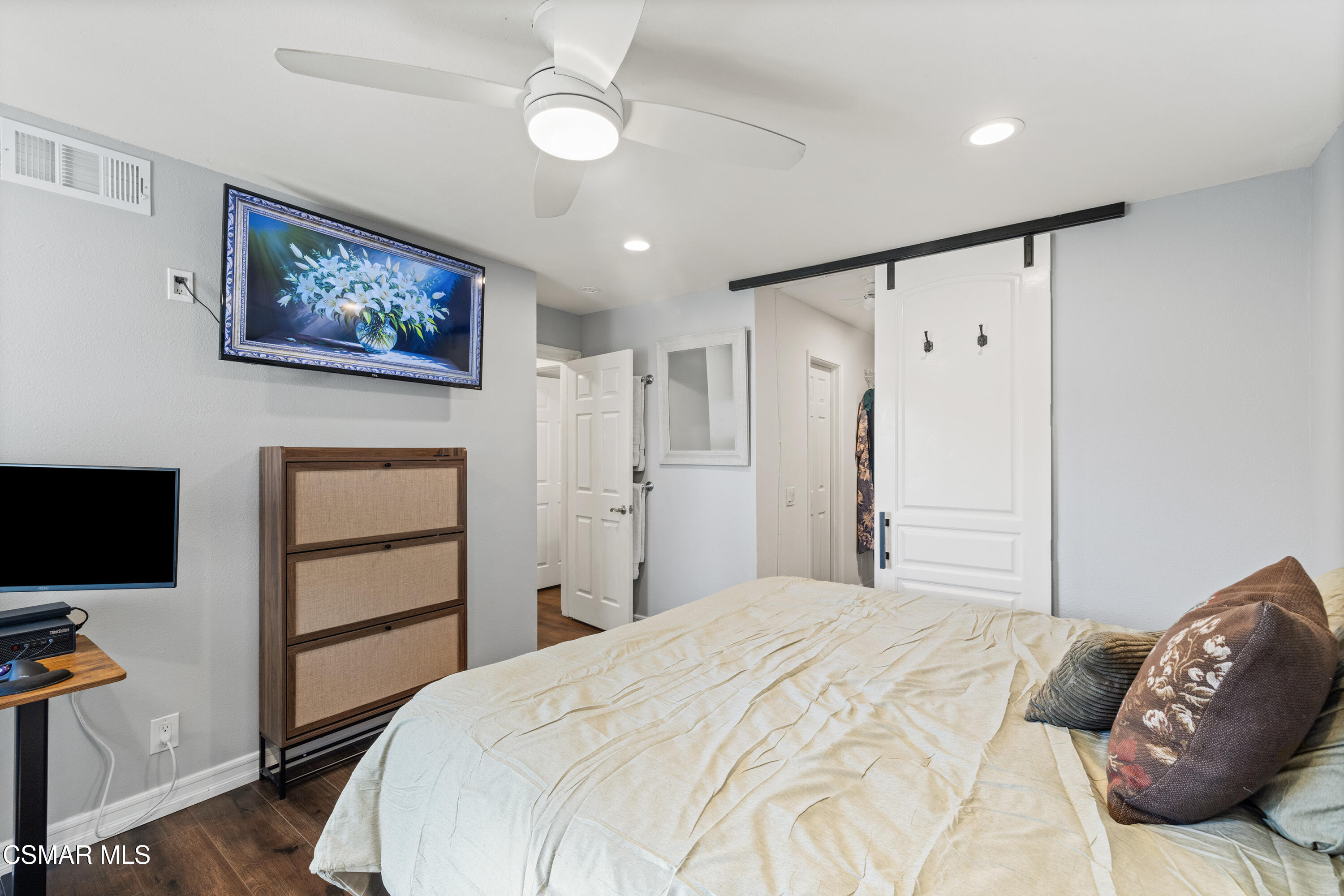 2225 Edelweiss Street, Unit 43 Oxnard, CA 93036 - Photo 13 of 26 a bedroom with a bed and a flat screen tv