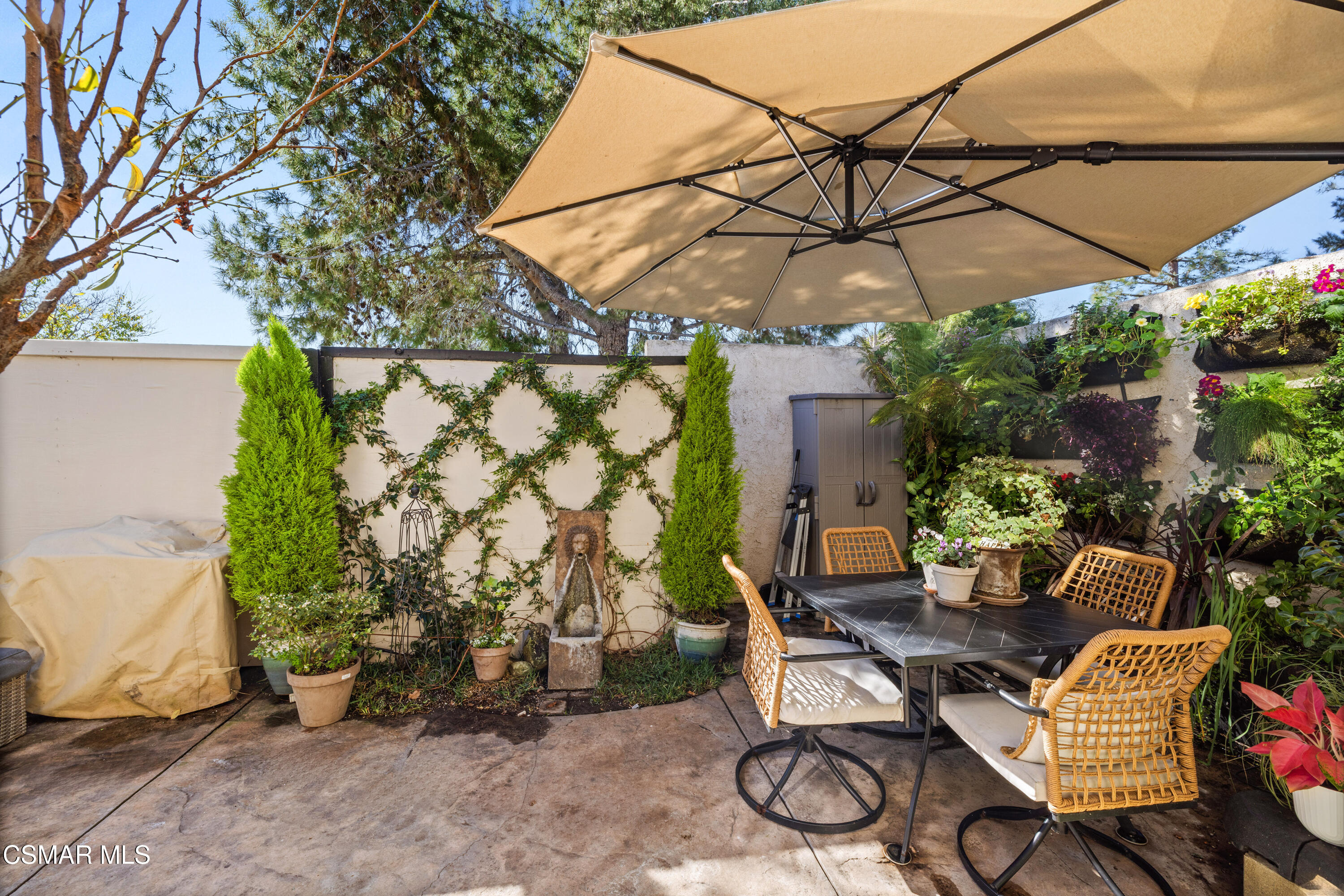 2225 Edelweiss Street, Unit 43 Oxnard, CA 93036 - Photo 19 of 26 a view of a chairs and table in backyard