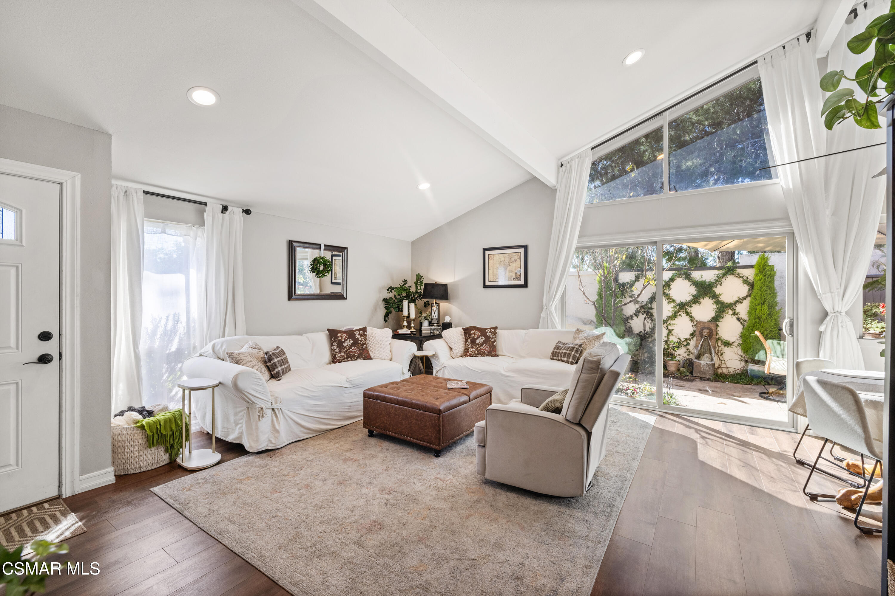 2225 Edelweiss Street, Unit 43 Oxnard, CA 93036 - Photo 5 of 26 a living room with furniture and a large window