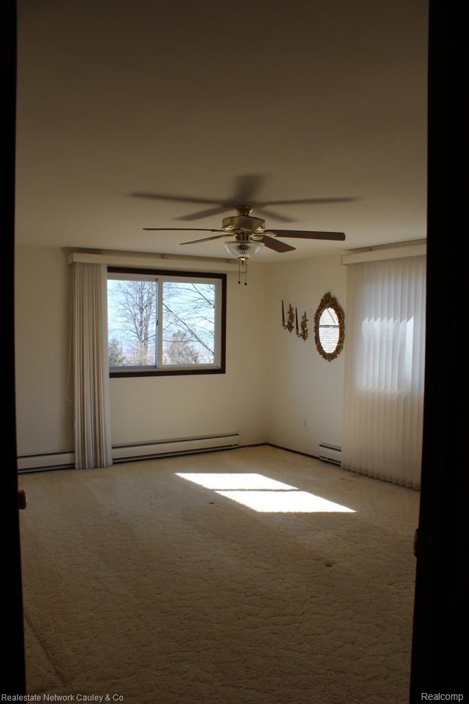 4706 Port Austin Road Caseville, MI 48725 - Photo 24 of 26 Master bed.jpg