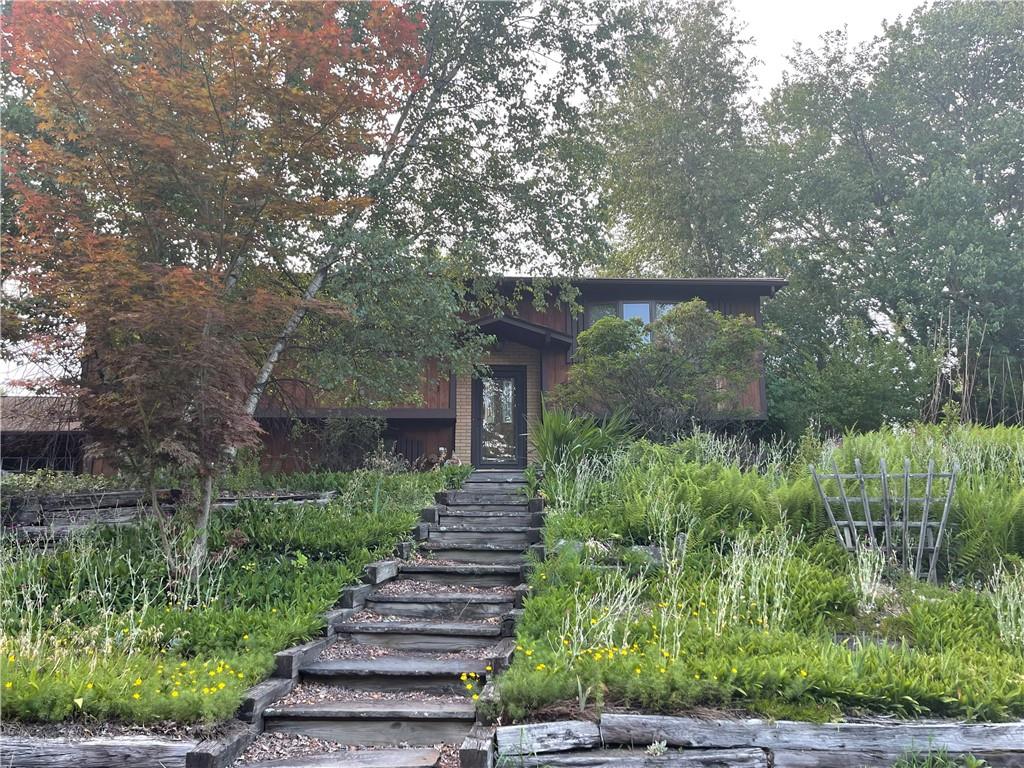 4 Dunn Road Airmont, NY 10952 - Photo 1 of 1 a view of a yard with plants and trees