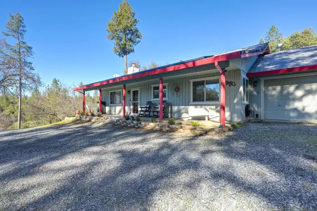 a backyard of a house with lots of green space