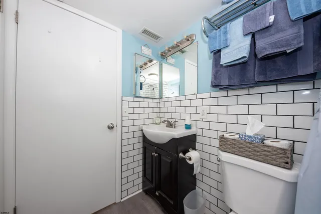 a bathroom with a sink and a toilet