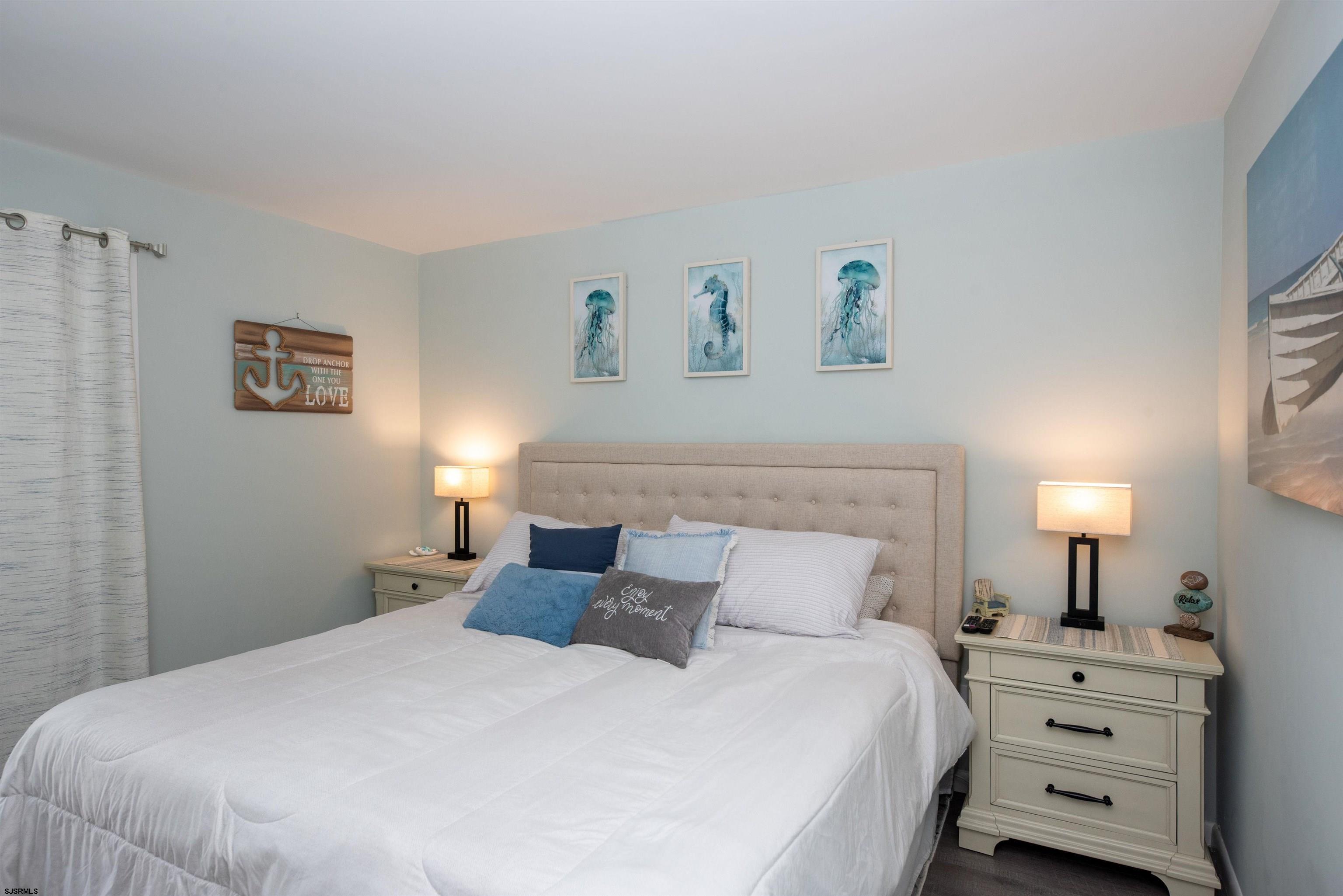 875 Plymouth Place, Unit 35 Ocean City, NJ 08226 - Photo 24 of 60 a bedroom with a bed and a closet