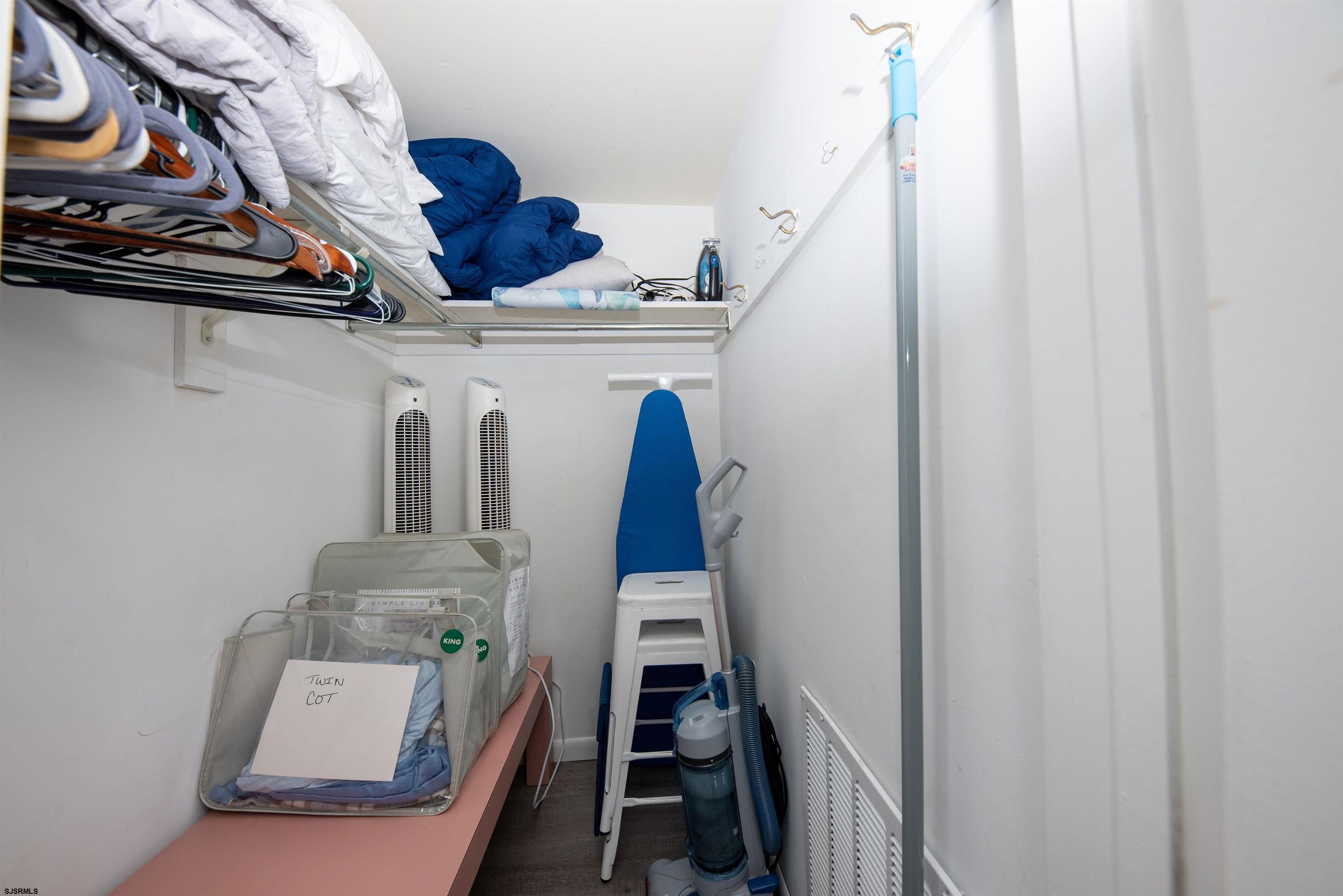 875 Plymouth Place, Unit 35 Ocean City, NJ 08226 - Photo 28 of 60 a view of walk in closet with clothes and shoes