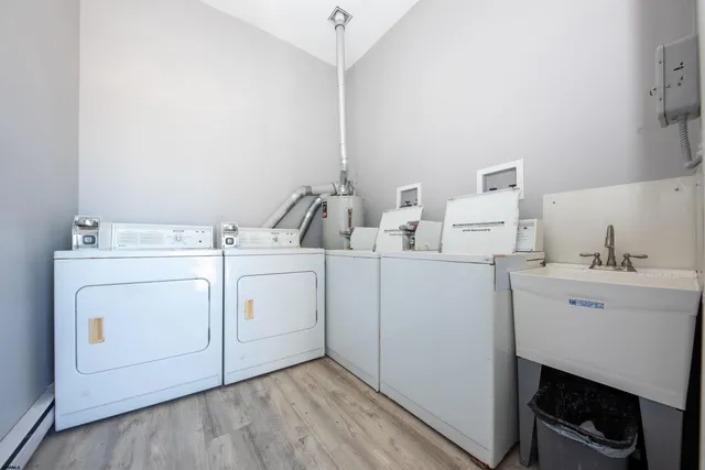 a swimming pool with outdoor seating