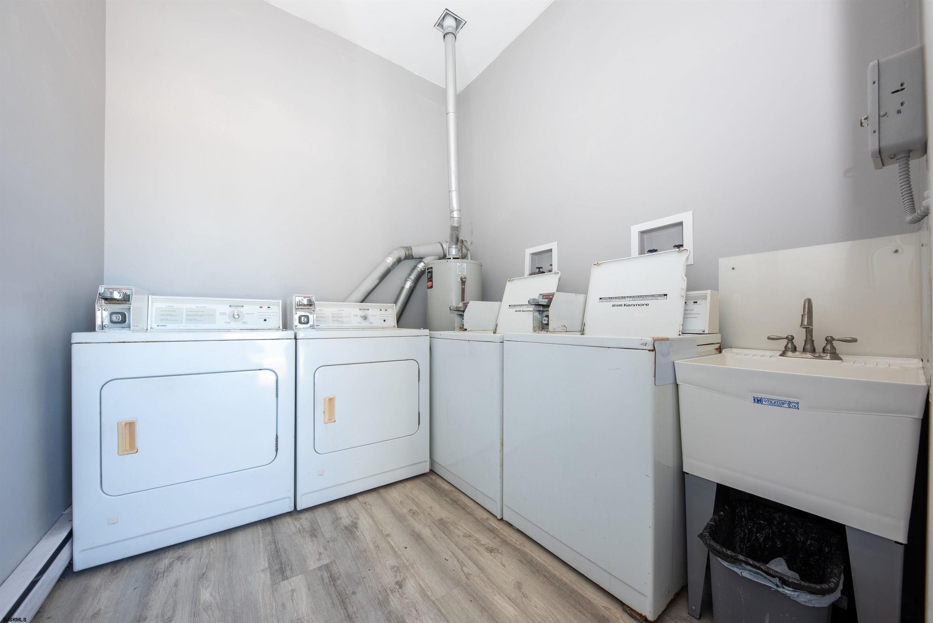 875 Plymouth Place, Unit 35 Ocean City, NJ 08226 - Photo 35 of 60 a utility room with dryer and washer