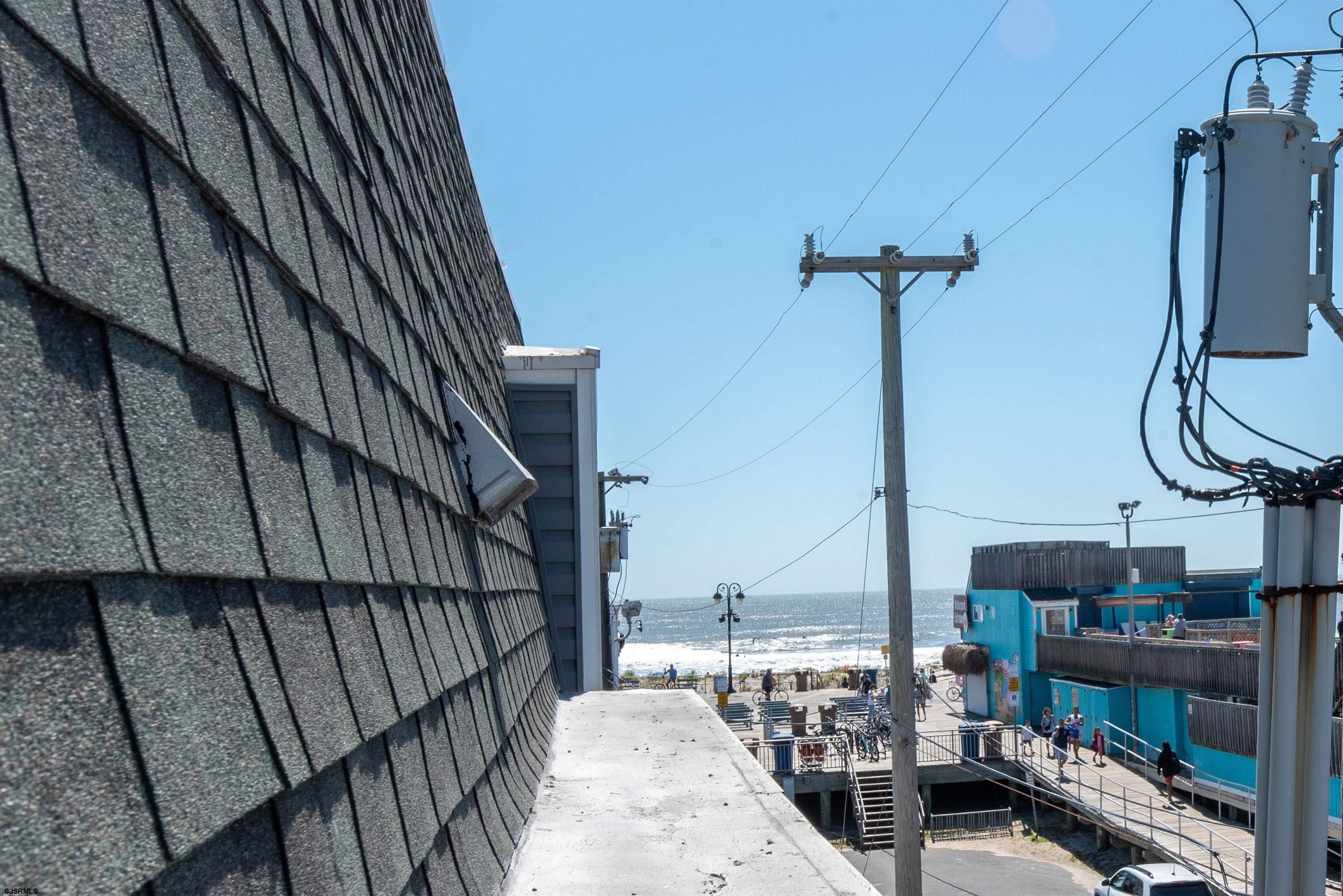 875 Plymouth Place, Unit 35 Ocean City, NJ 08226 - Photo 38 of 60 a view of staircase with railing and white walls