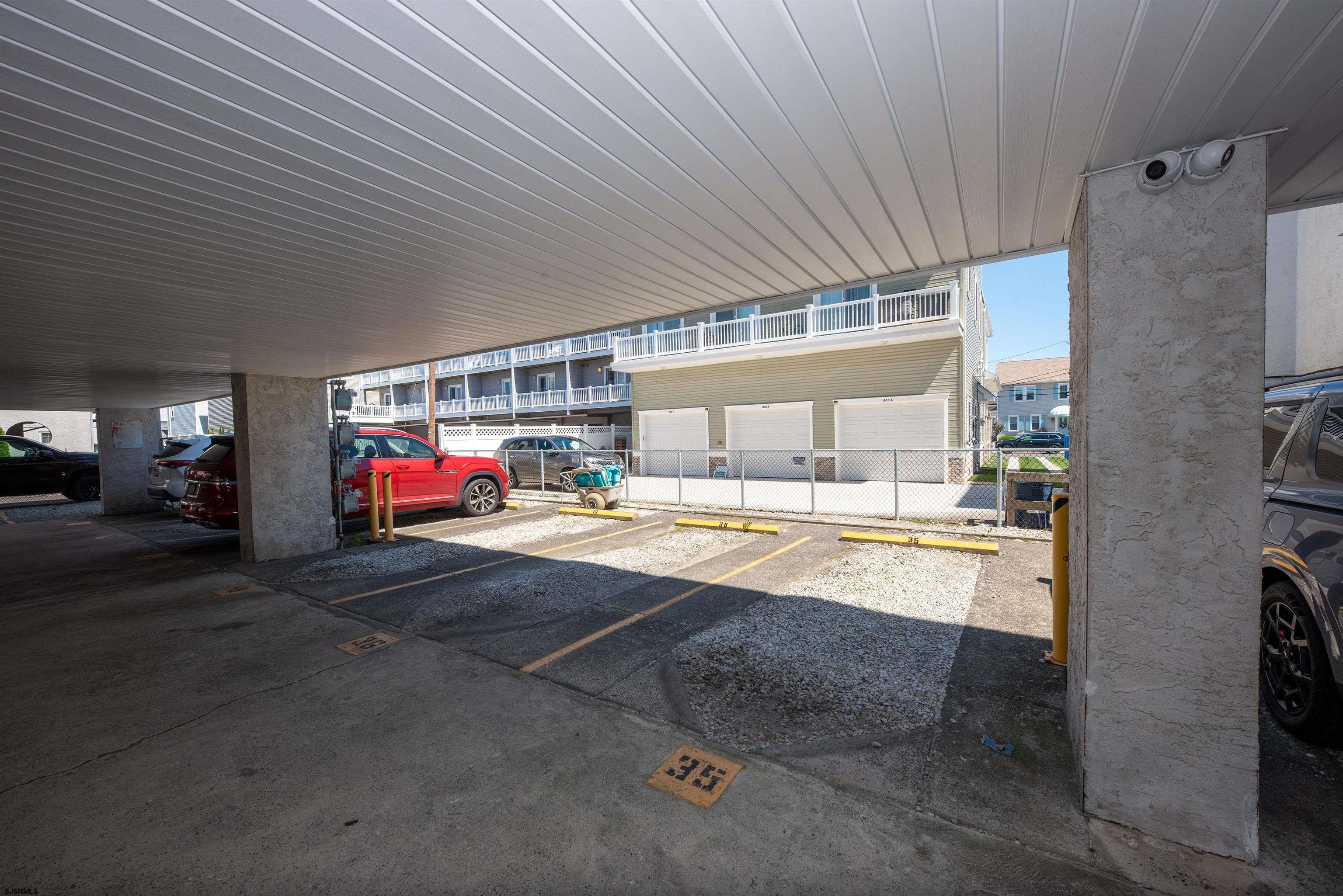875 Plymouth Place, Unit 35 Ocean City, NJ 08226 - Photo 40 of 60 a swimming pool with outdoor seating