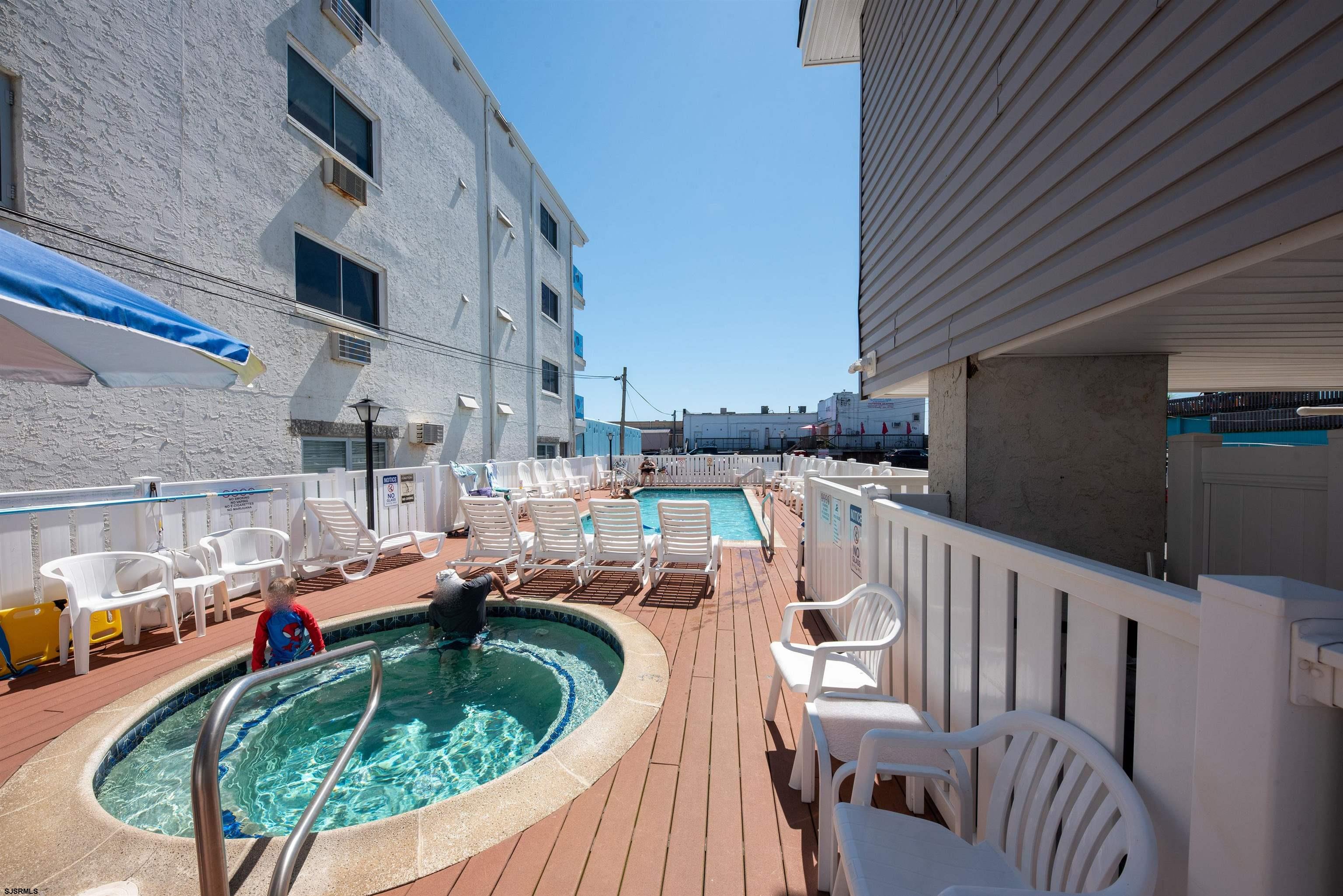 875 Plymouth Place, Unit 35 Ocean City, NJ 08226 - Photo 41 of 60 a picture of table and chairs in patio