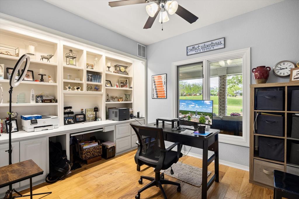 8911 Bontura Road Granbury, TX 76049 - Photo 21 of 39 Home office featuring light wood finished floors and a ceiling fan