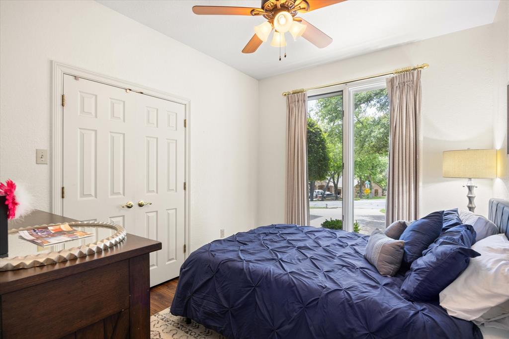 8911 Bontura Road Granbury, TX 76049 - Photo 29 of 39 Bedroom with access to exterior, wood finished floors, and ceiling fan