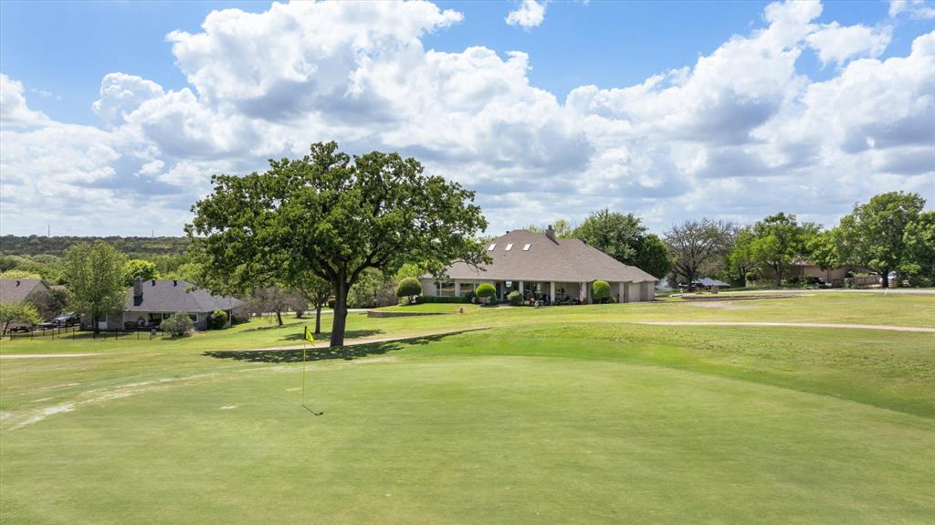 8911 Bontura Road Granbury, TX 76049 - Photo 36 of 39 View of property's community with view of golf course