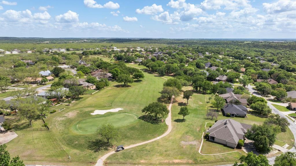 8911 Bontura Road Granbury, TX 76049 - Photo 37 of 39 Aerial view of residential area featuring a golf course