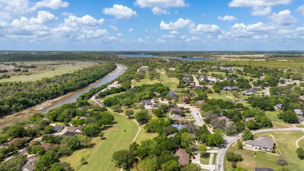 8911 Bontura Road Granbury, TX 76049 - Photo 38 of 39 Aerial perspective of suburban area with a large body of water