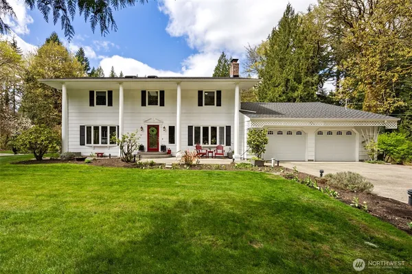 front view of a house with a yard