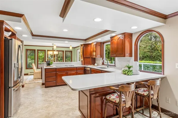 a view of a dining room with furniture window and outside view