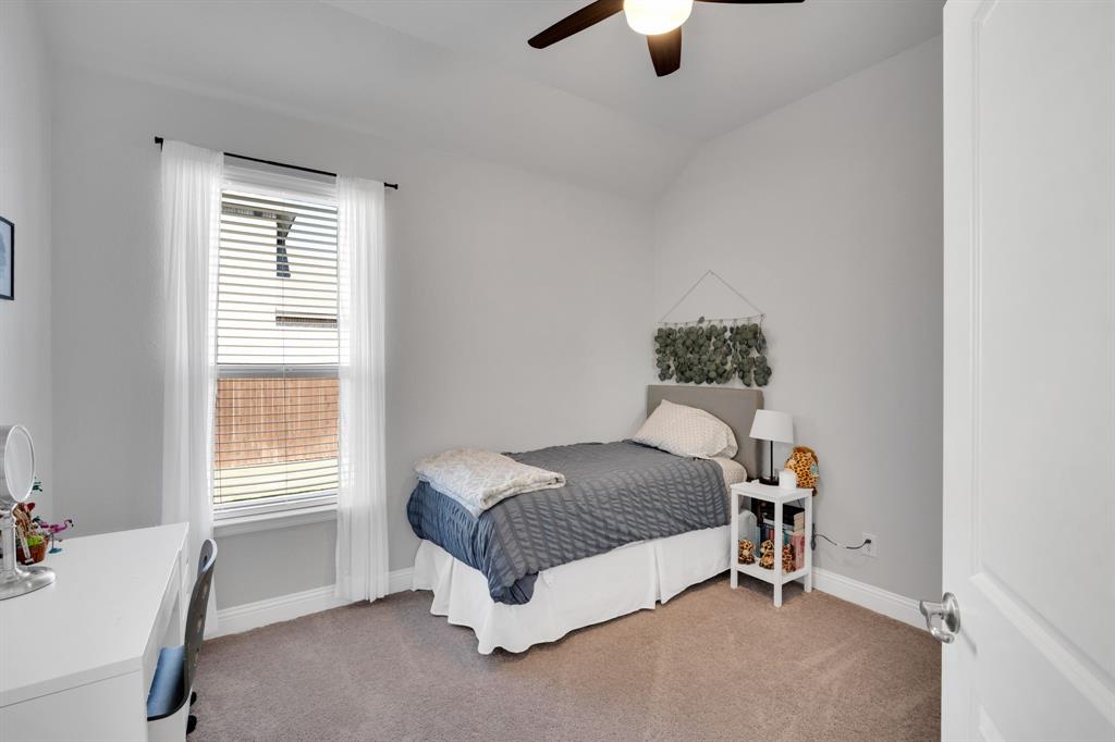 5642 Ranger Drive Midlothian, TX 76065 - Photo 28 of 40 a bedroom with a bed and window