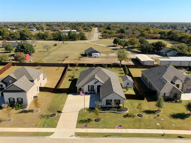 a view of a house with swimming pool