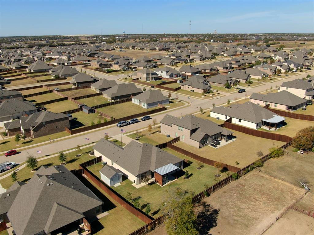 5642 Ranger Drive Midlothian, TX 76065 - Photo 39 of 40 an aerial view of a houses with a city view