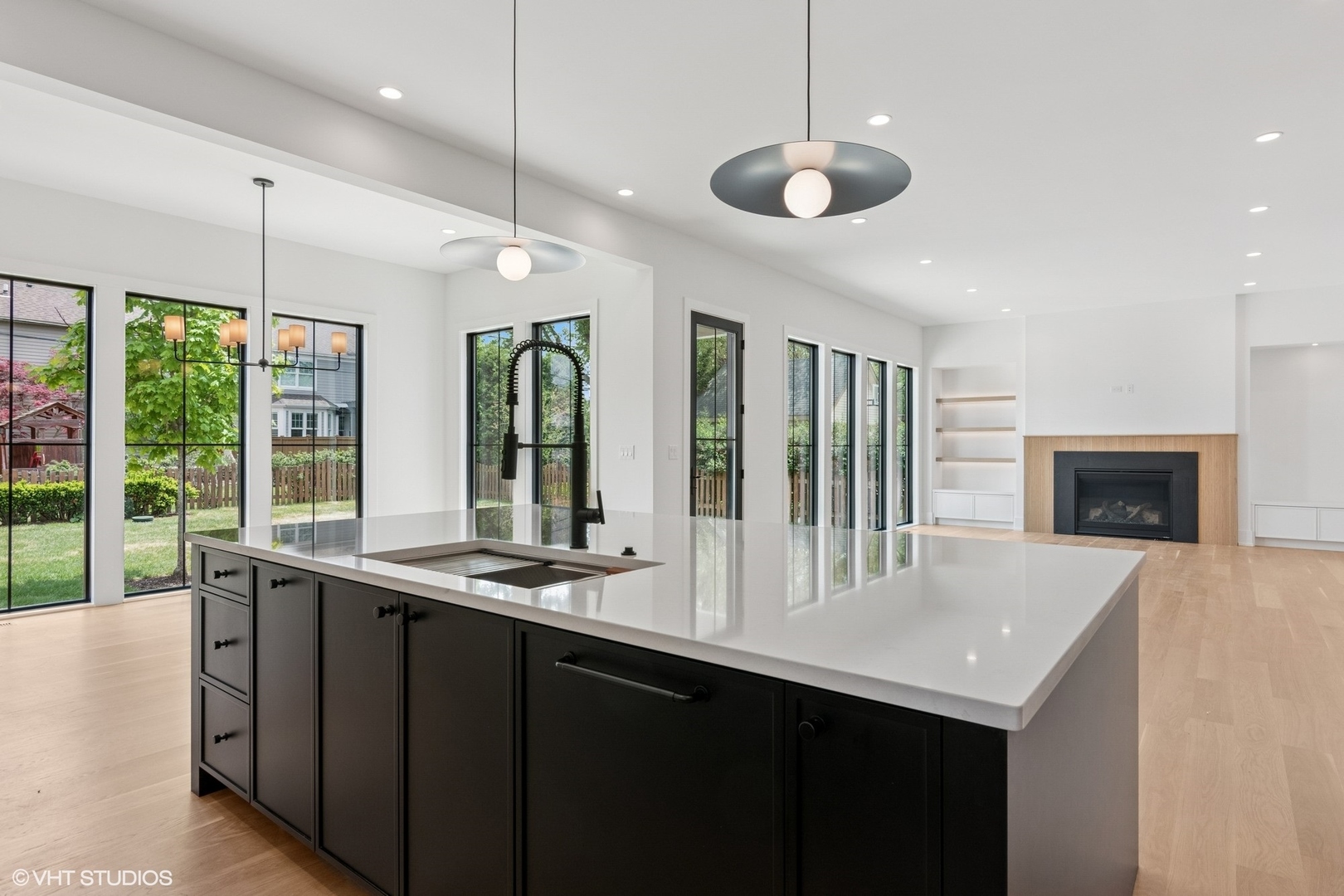 613 Chatham Avenue Elmhurst, IL 60126 - Photo 12 of 37 a kitchen with center island and windows