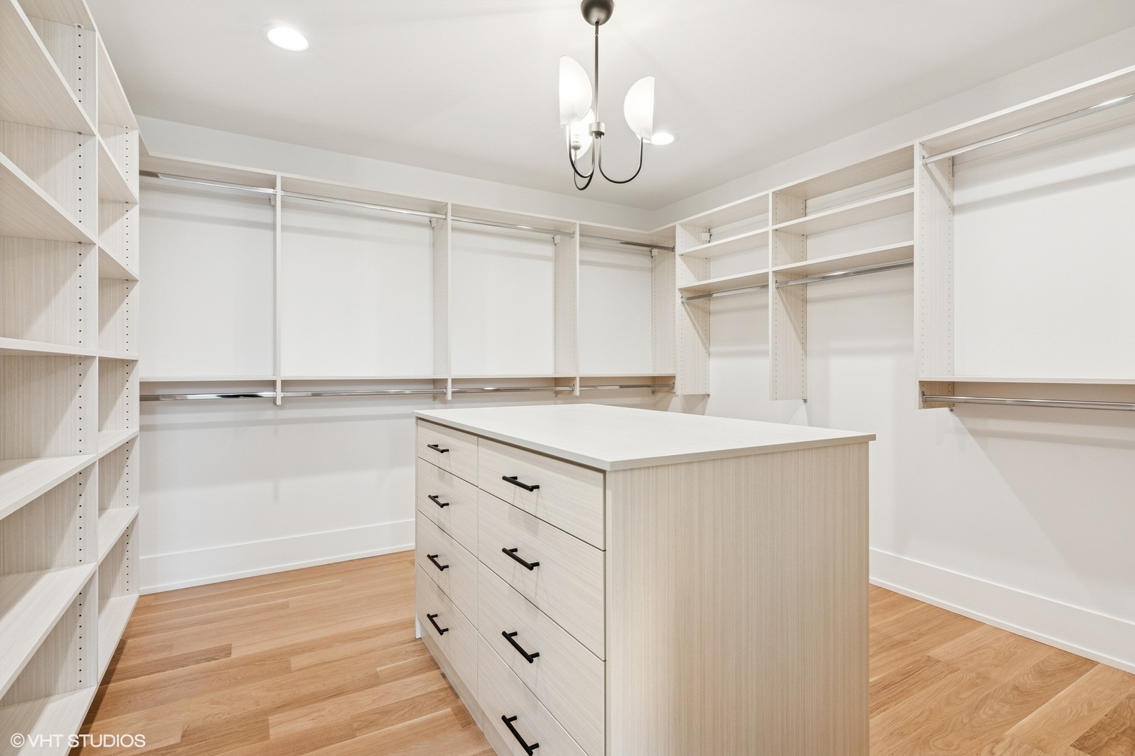 613 Chatham Avenue Elmhurst, IL 60126 - Photo 18 of 37 a kitchen with a refrigerator and white cabinets
